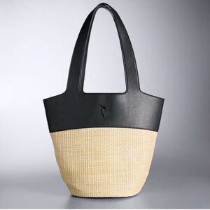 Vera Wang rattan bag.
